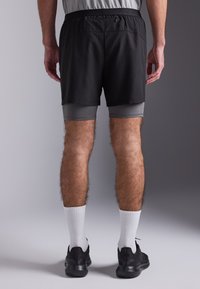 Pier One Sport 2 IN 1 SHORTS WITH DOUBLE CONTRAST LAYER - Sports shorts - black/dark grey