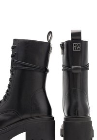 Gino Rossi Puszābaki ar platformu - black