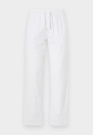 Pantaloni in cotone bianco, leggeri, con elastico in vita e cordino; presentano gambe ampie e una superficie liscia, senza trame.