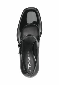 Černé lakované kožené baleríny typu Mary Jane s kulatou špičkou, nastavitelného popruhem a detailem s přezkou. Uvnitř se nachází název značky a velikost.