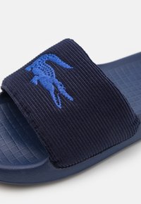 Lacoste SERVE SLIDE 1.0  - Mules - navy