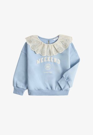 Lyseblå sweatshirt med cremefarvet øjekantspyntet krave og hvid "WEEKEND A PARIS 1972" tekst foran, med ribbede manchetter og kant.