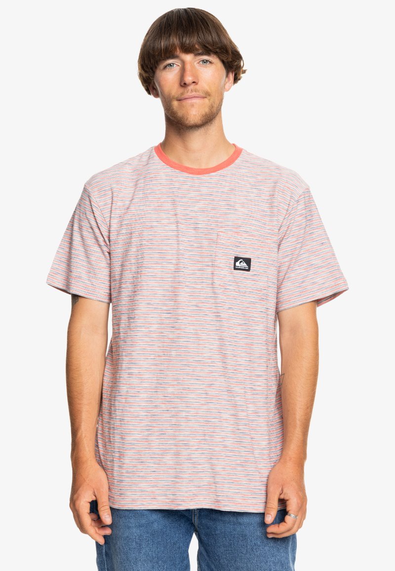 Striped t-shirt featuring pink and blue hues, round neckline with red trim, chest pocket, and a small logo patch on the left side.