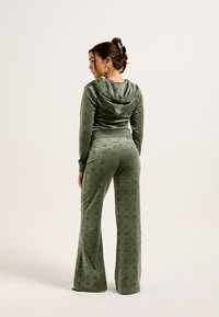 Juicy Couture - MONOGRAM LISA  - Tracksuit bottoms - thyme Thumbnail Image 1