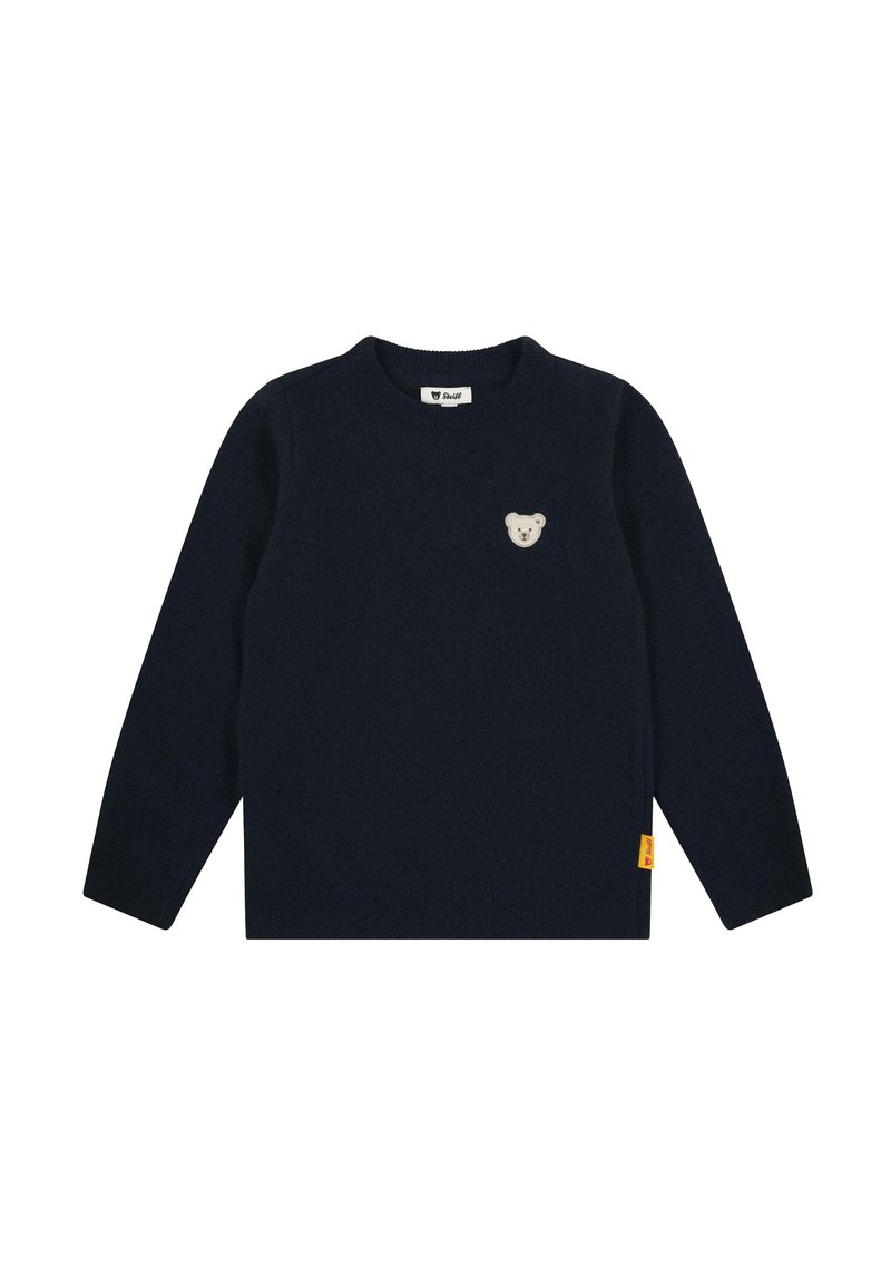 Navyblauer Pullover aus weichem Stoff, mit rundem Ausschnitt, langen Ärmeln und einem kleinen Bärenlogo auf der Brust sowie einem gelben Etikett an der Seite.
