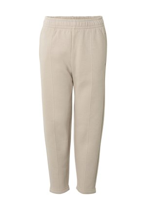 Beige zulaufende Sweatpants mit elastischem Bund und Nahtdetails aus weichem, bequemem Stoff.