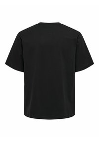Svart bomulls t-shirt med rund halsringning och korta ärmar. Slät textur, lös passform och inga synliga mönster eller accenter.