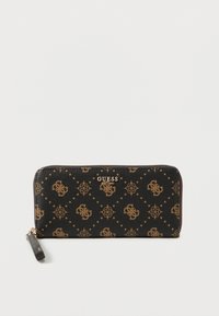 Čierna peňaženka z umelého kože s béžovým geometrickým vzorom a logom "GUESS". Zapínanie na zips s malým príveskom. Kompaktný dizajn.