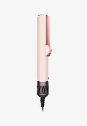 Asciugacapelli in rosa e beige, design cilindrico allungato con impugnatura texturizzata, griglia anteriore per l'aria e cavo di alimentazione nero.