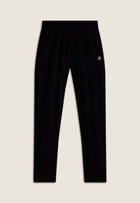 Pantaloni da jogging in velluto nero con vita elastica, dotati di tasche laterali e un piccolo logo dorato sul coscio sinistro.