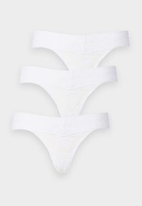 White lace thongs with a soft fabric band, featuring a floral pattern on the lace and a smooth, seamless design. Three pieces stacked.