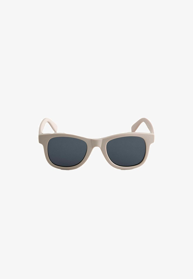 Lunettes de soleil rectangulaires beige avec des verres teintés foncés et des montures épaisses présentées sur fond blanc.