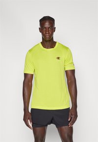 Champion CREWNECK TRAIN SMALL LOGO - Basic póló - neon yellow