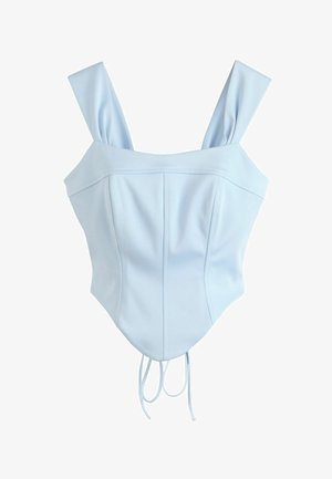 Light blue sleeveless corset-style top with wide straps, panel seams, and ribbon ties hanging from the bottom hem.
