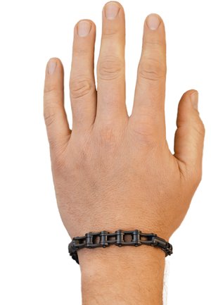 Black chain-link bracelet worn on a hand, featuring interlocking links with a smooth surface and subtle hardware accents.