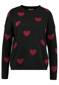 Musta neulepaita, jossa on hajallaan kimaltavia punaisia sydämiä. Klassinen pyöreä kaula-aukko, pitkät hihat ja resorireunus. Rentoa istuvuutta.