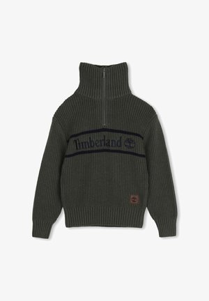 Donkergroene geribde gebreide trui met een hoge ritskraag, Timberland-logo op de borst en een klein logopatchje aan de zoom.