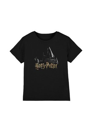 Black T-shirt with gold "Harry Potter" text and dark silhouette of a castle with tall pointed towers in the center.