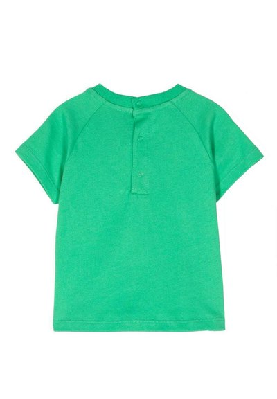 T-shirt in cotone verde con maniche a raglan corte, dotato di chiusura a scatto sul retro e texture liscia. Design minimalista, senza motivi.