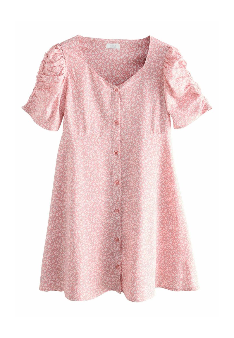 Rosa skjortklänning med ett blommönster, korta puffärmar och en utsvängd nederkant. Tillverkad av lätt material med en mjuk textur.