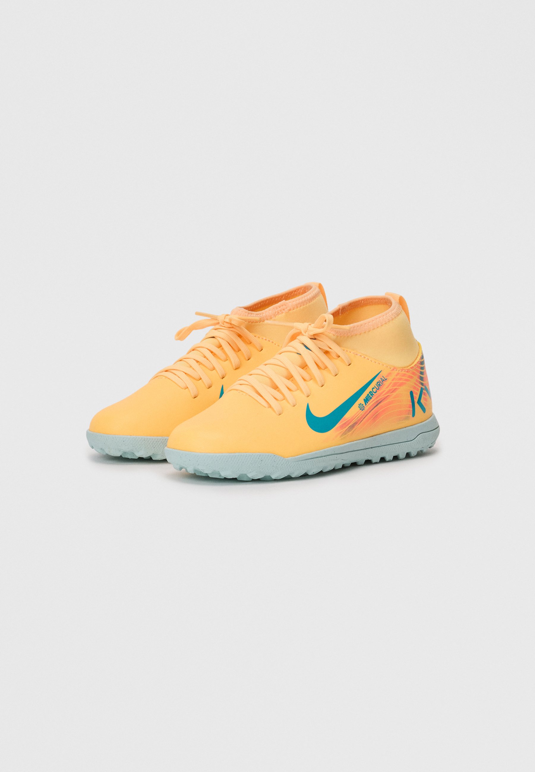 yellow nike astro turf