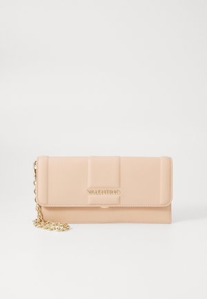 Peach leather wallet with a flap closure, gold logo, and chain strap. Features a quilted design on front for texture.