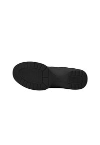 Zwarte rubberen zool met een getextureerd loopvlakpatroon. Heeft een ronde vorm en een gladde oppervlakte, ontworpen voor grip en duurzaamheid.