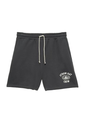 Shorts décontractés gris foncé avec cordon blanc et texte et logo blancs "Straw Hat Crew" sur le bas de la jambe gauche.