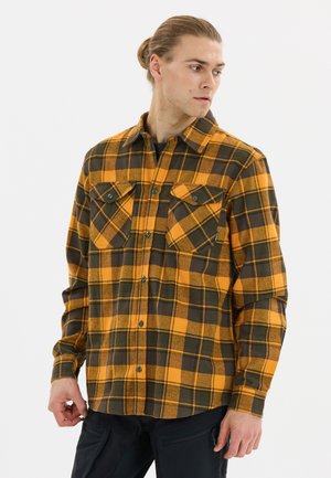 Rute skjorte i flannel med orange og mørkegrønne firkanter, knap-op design, to brystlommer og en afslappet pasform. Tekstureret stof.