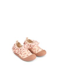 Rosa slip-on skor med en volangdetalj i tyg, med ett sjöhästmönster på en slät ovandel och en strukturerad gummisula.