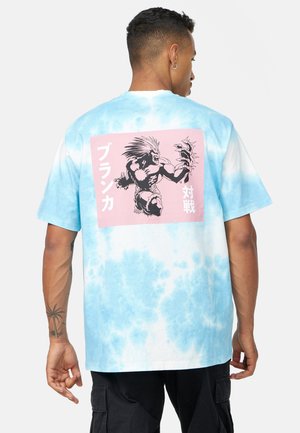 Blue and white tie-dye t-shirt featuring a pink graphic with a black illustration of a character and Japanese text on the back. Short sleeves.