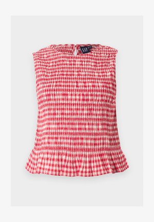 Punase-valge ruuduline varrukateta top, millel on kroogitud kangas, volangidega alumine serv ja tagaküljel võtmekujuline nööp.