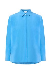 Camicia a maniche lunghe di colore azzurro chiaro realizzata in tessuto morbido, caratterizzata da un colletto classico e una chiusura con bottoni, con un orlo leggermente curvo.