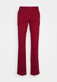 Pantaloni di cotone rossi con un design a gamba svasata, caratterizzati da una chiusura con bottone e tasche, texture liscia e collezione a tinta unita senza fantasie.