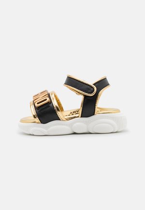 Slip-ins - black/gold