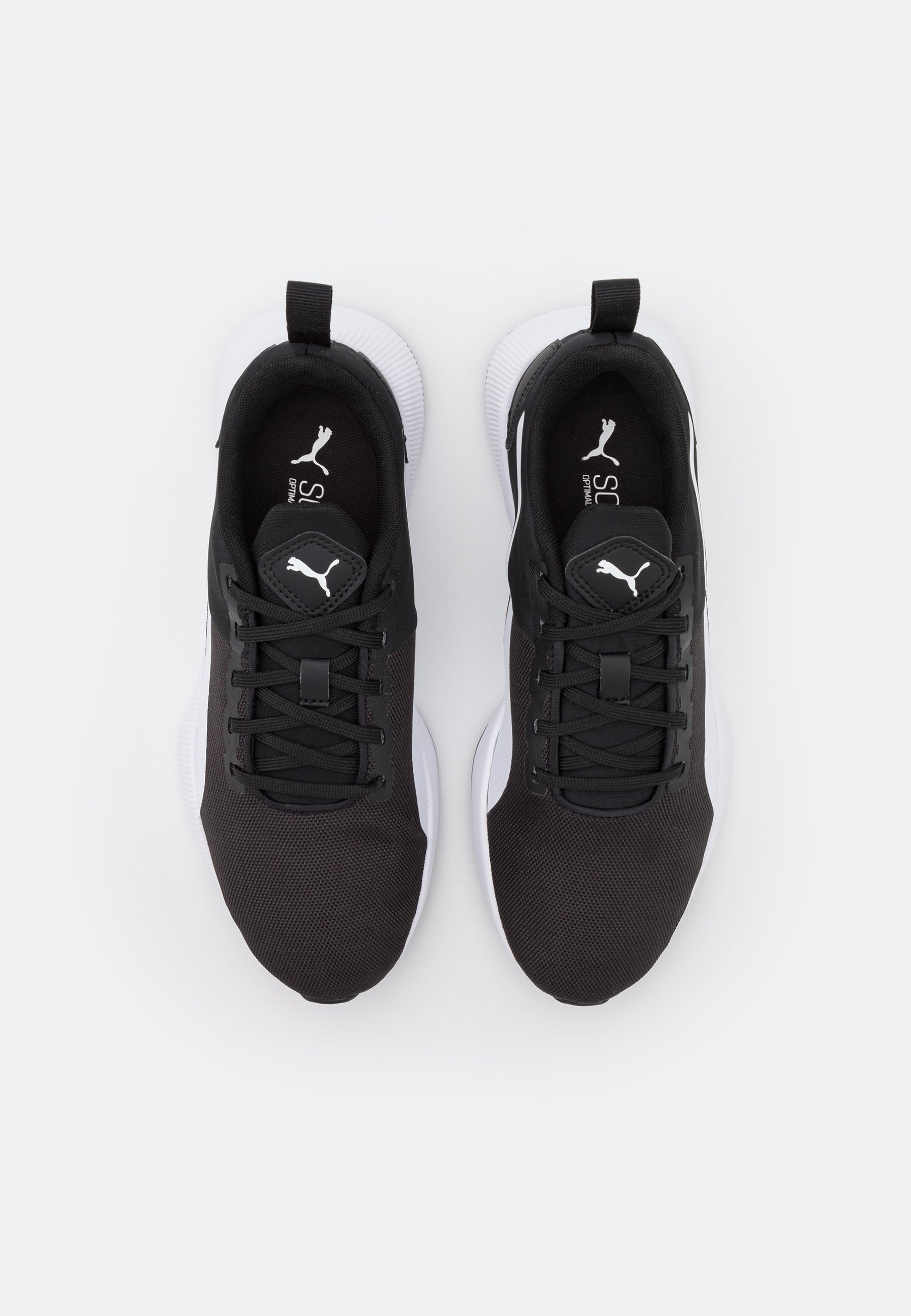puma flyer runner black white
