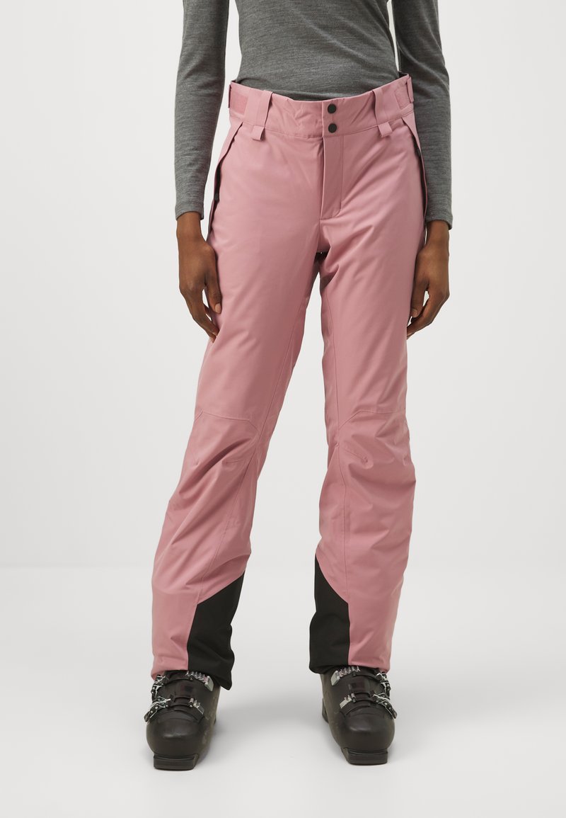 Pantalons de ski roses imperméables avec accents noirs, présentant une taille haute, une fermeture à bouton en métal et des poches latérales. Le matériau semble lisse et durable.