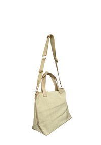 Borsa beige a texture con dettagli in pelle color nocciola, manici doppi e tracolla regolabile, caratterizzata da una forma rettangolare strutturata.