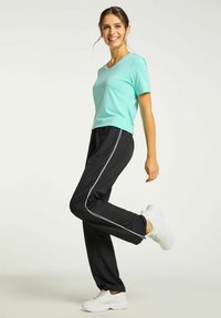 Joy-Sportswear BUNDLE MIT SEITLICHEM REISS - Spodnie treningowe