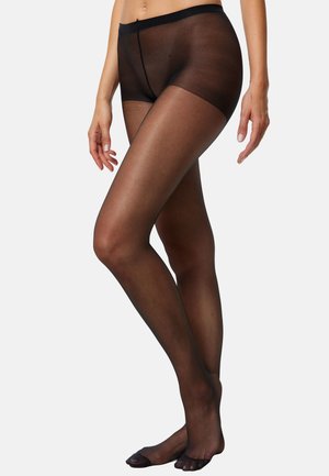 Collants noirs transparents avec une texture lisse et une taille haute, offrant une coupe ajustée aux jambes s'étendant jusqu'aux chevilles.