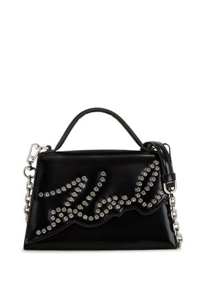 Black leather handbag with a polished finish, featuring a wavy studded design, top handle, and detachable chain strap.