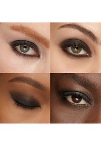 Quatre gros plans sur des yeux avec des teints de peau variés, tous présentant un maquillage des yeux smoky foncé et des sourcils définis.