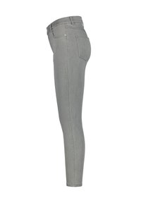 Slim-fit grey denim jeans with a smooth texture, mid-rise waist, and standard pockets. The design features minimal stitching and a classic cut.