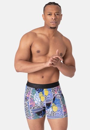Boxers pour hommes extensibles avec un design ajusté, dotés d'une ceinture noire et d'une œuvre graphique multicolore vibrante. Tissu doux et texture lisse.