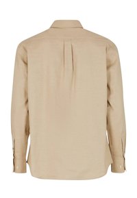 Lichtbeige langlijfshirt met een omklapbare kraag, enkele achterplooien en knoopmanchetten. Glad weefsel, klassieke pasvorm.