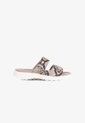 Slide sandal with two wide snakeskin-patterned straps and a white cushioned sole, viewed from the side.