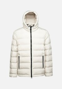 Ullig jacka i off-white färg med huva, har en framdragkedja och två sidofickor med svarta accenter och quiltad detalj.