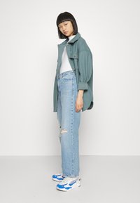 Dr.Denim Petite ECHO - Calças de ganga de corte relaxado - empress light blue