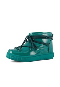 Turquoise patent leather ankle boots with a chunky rubber sole, featuring decorative lacing and prominent stitching details.