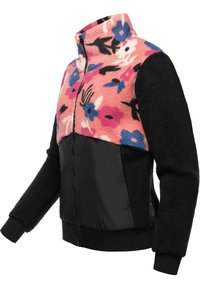Giacca in pile con un motivo floreale rosa nella parte superiore e maniche e parte inferiore in tessuto nero testurizzato. Chiusura frontale con zip.